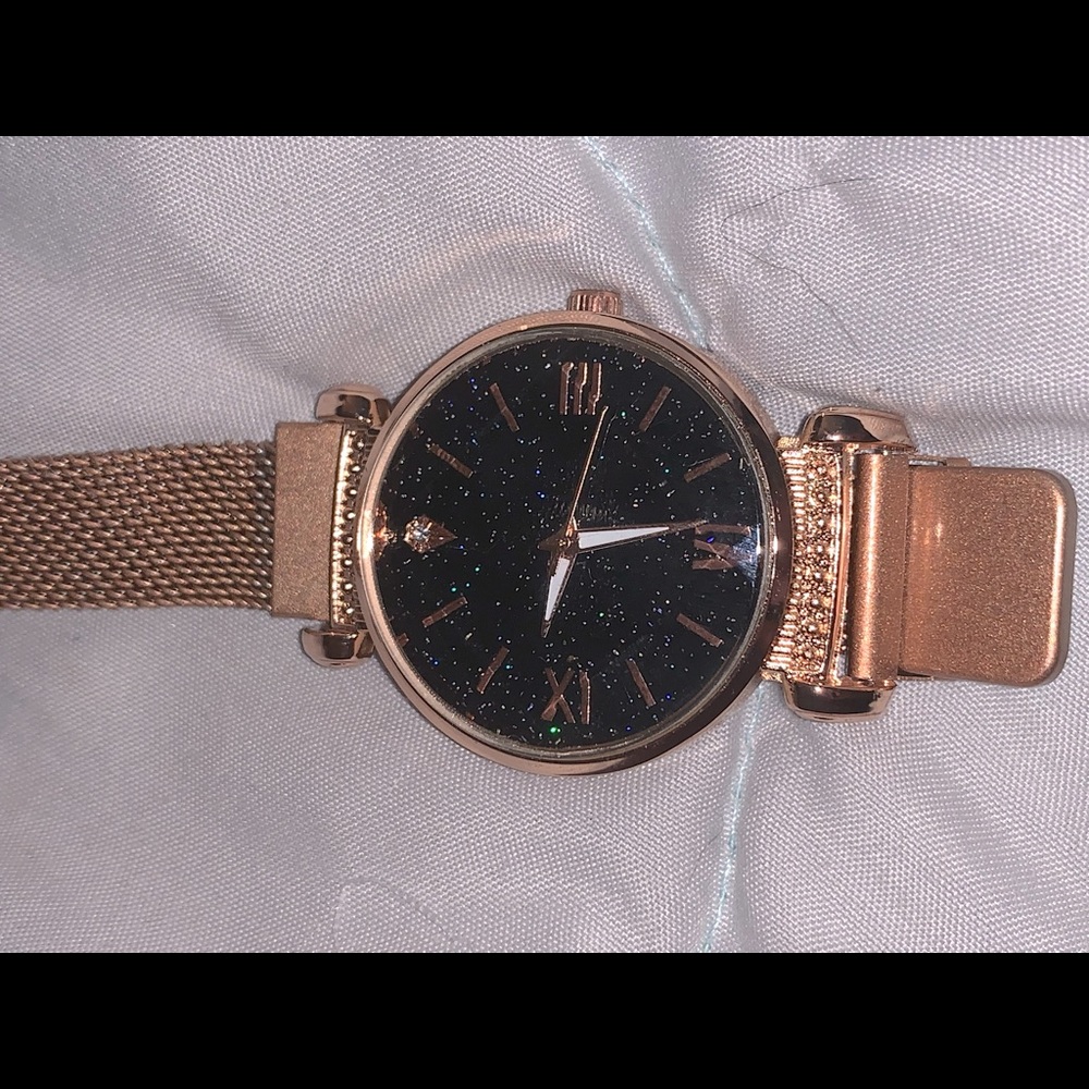 Rose Gold magnetic watch.